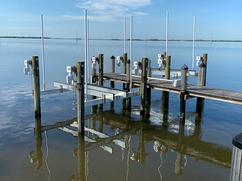 Boat lift installation at a private Vero Beach waterfront residence