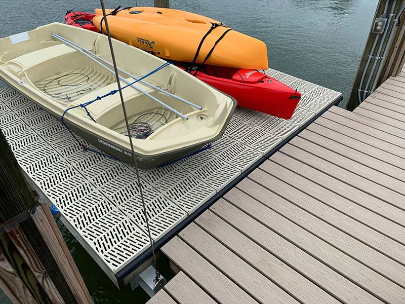 Heavy-duty boat lift supporting a cruiser at an Indian River Lagoon dock
