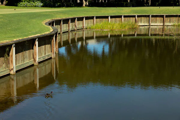 Completed seawall retaining structure along an Indian River Lagoon shoreline